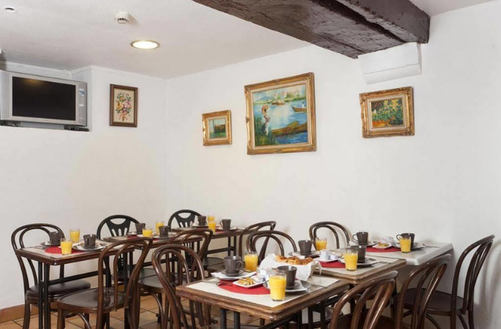 Hotel Petit Bastille Aulnay-sous-Bois Restaurace fotografie